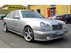    Mercedes-Benz E-Class W210  Lorinser ()